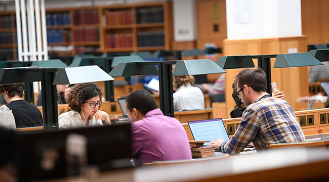 Researchers in a British Library Reading Room